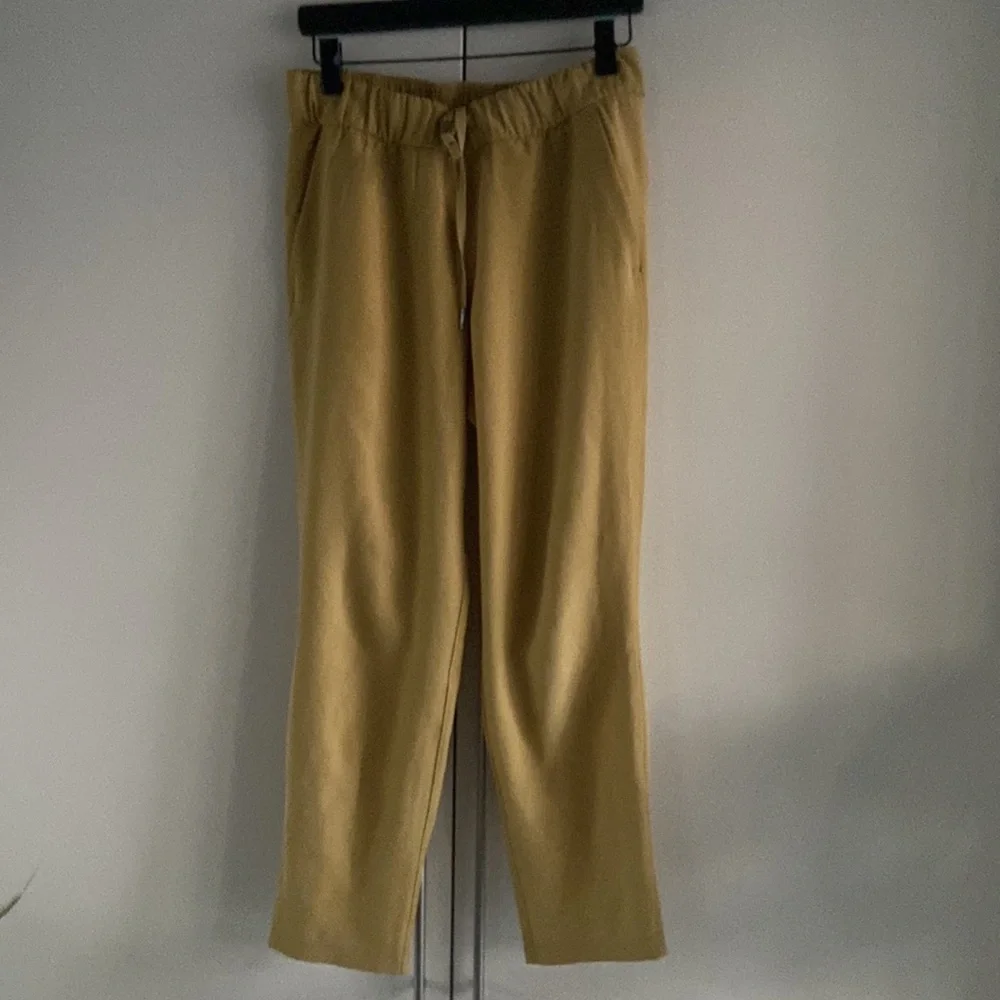 Lululemon On the Fly 7/8 Pant *Woven - Picture 5 of 15